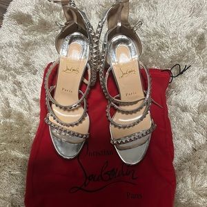 Size 10 women’s Christian louboutin silver heels